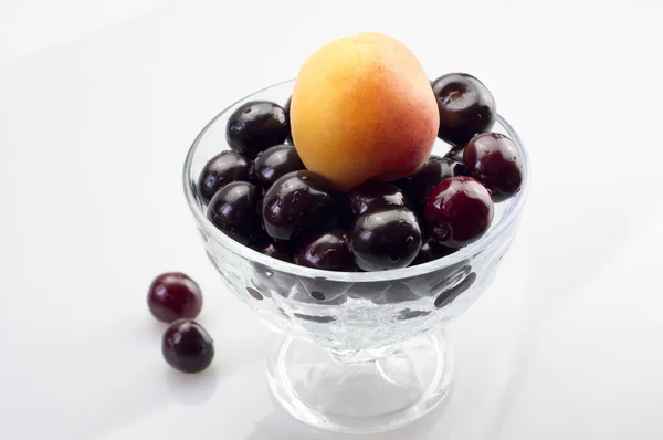 Apricot and cherries — Stock Photo, Image
