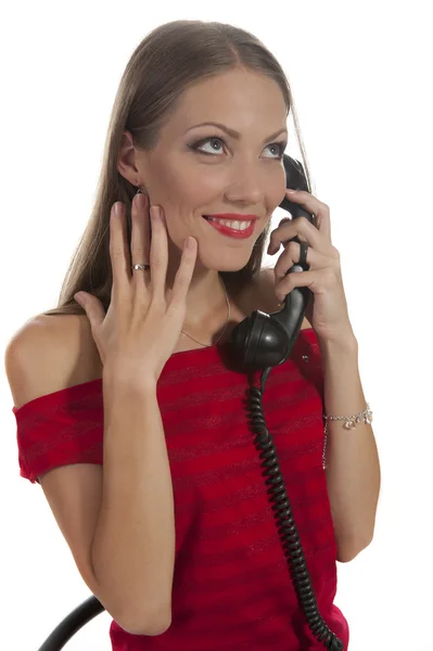 Donna con un vecchio telefono — Foto Stock