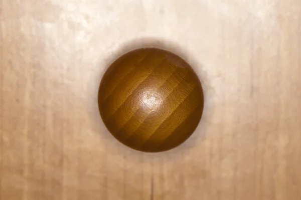 Spherical wooden cabinet knob — Stock Photo, Image