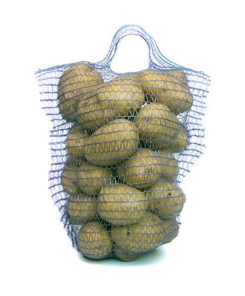 Potatis i en påse. — Stockfoto