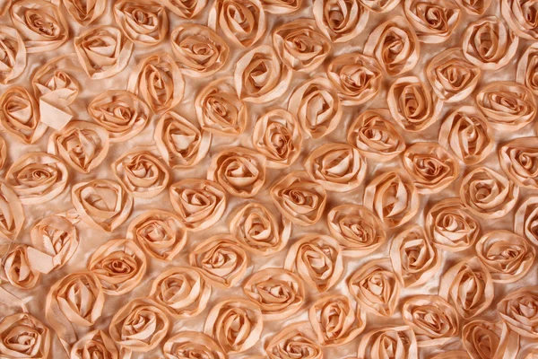 Фон из ткани оранжевой розы — стоковое фото