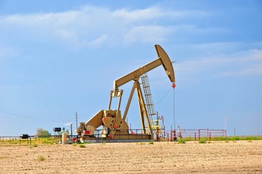 Large Pump Jack Pulling Crude Oil Up clipart