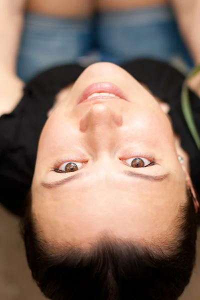 stock image Young beautiful woman looking up