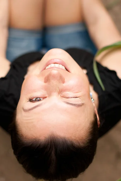 stock image Young beautiful woman looking up