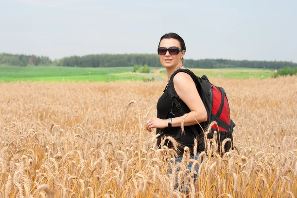 stock image Young woman with backpack