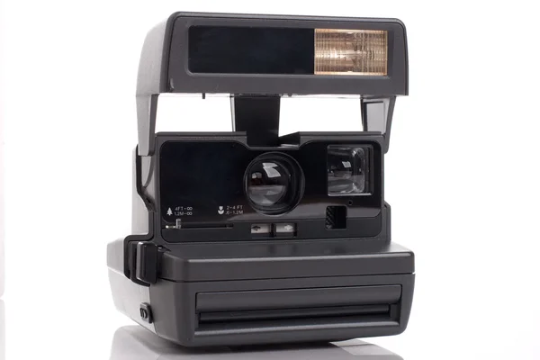Old instant analog film camera — Stock Photo, Image