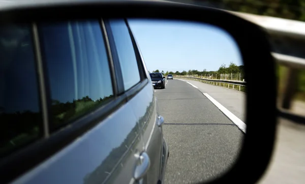 Car mirror reflection — Stock Photo, Image