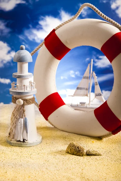 Life buoy on the beach — Stock Photo, Image