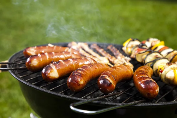 Closeup of meat on grill — Stock Photo, Image
