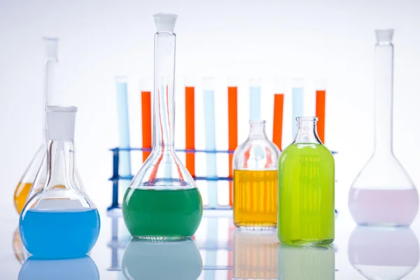 Laboratory flasks with fluids of different colors — Stock Photo, Image