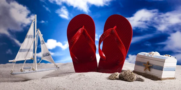 Sand beach and flip flops — Stock Photo, Image