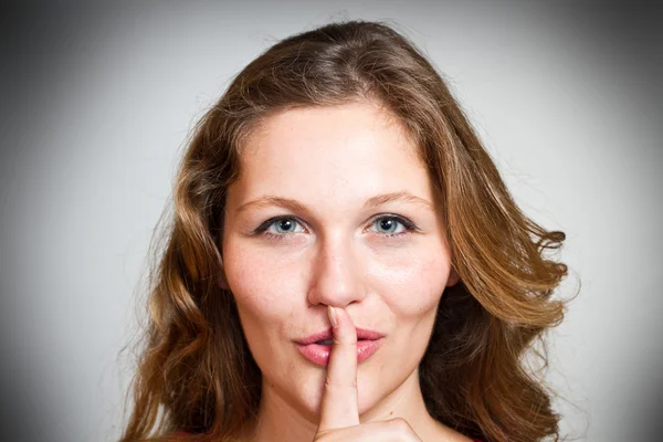 A sign of being quiet- hush Royalty Free Stock Images