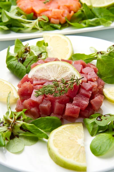 Salmon, tuna and swordfish tartare — Stock Photo, Image