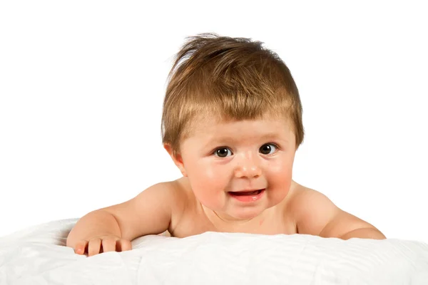 Rozkošný, smějící se dítě při pohledu na fotoaparát — Stock fotografie