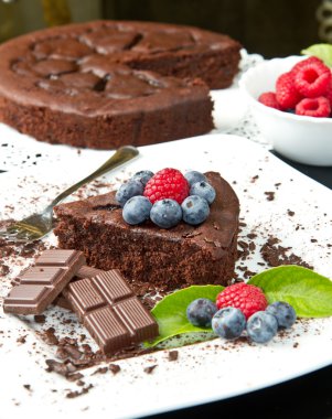 Chocolate cake with fresh berry clipart