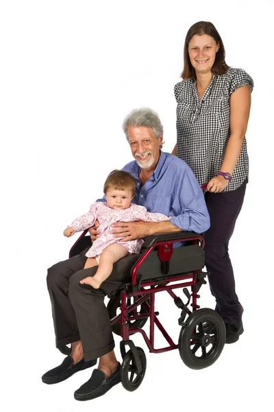 坐在轮椅上的残障祖父的儿童 — 图库照片