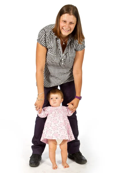 Baby taking first steps — Stock Photo, Image