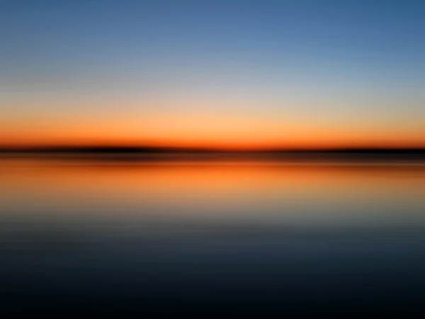 stock image Motion blurred sunset on sea