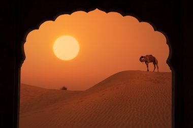Silhouette of arabic architecture on desert clipart