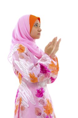 Female Muslim prayer on white background clipart
