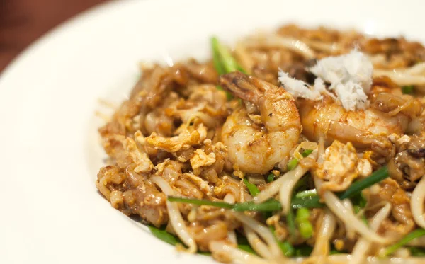 Fried Penang Char Kuey Teow which is a popular noodle dish in Ma — Stock Photo, Image