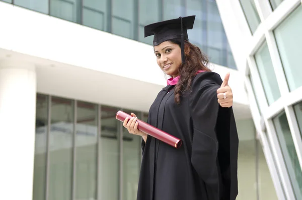 Malaysian indian graduate with thumbs up — Stock Photo, Image