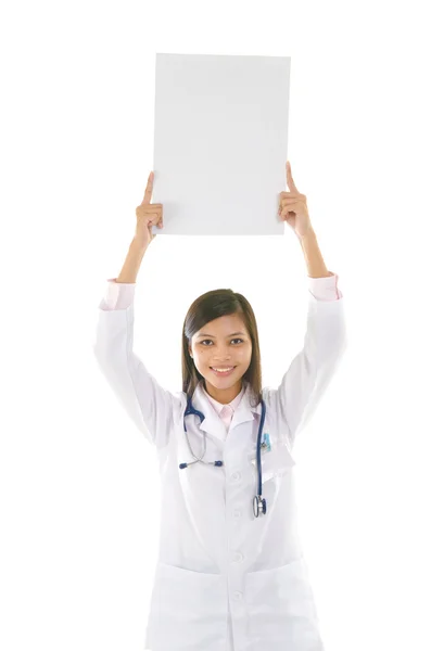 Malese razza mista asiatico medico con bianco cardcoard — Foto Stock
