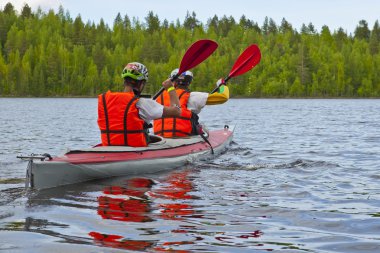 Canoe in white sea clipart