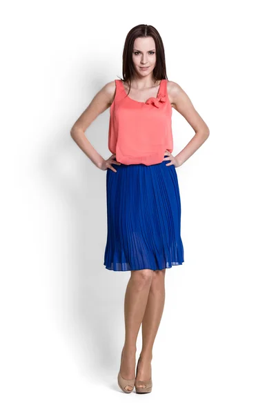 Mooie vrouw in blauwe rok — Stockfoto