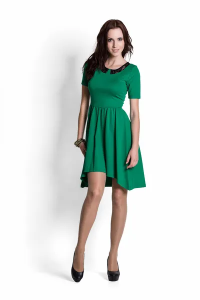 Beautiful woman in green dress — Stock Photo, Image