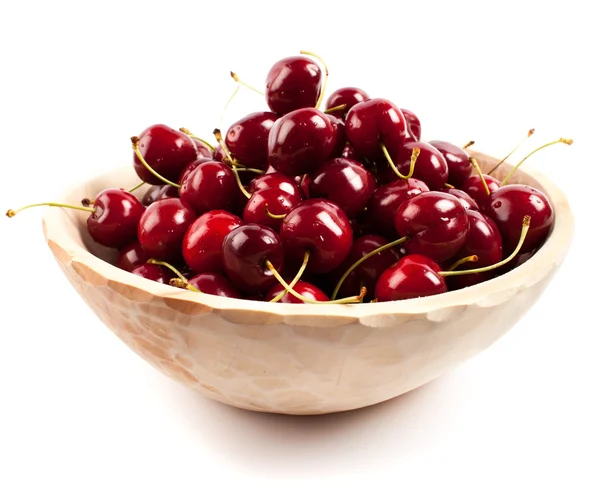 Cherries in a wooden bowl — Stock Photo, Image