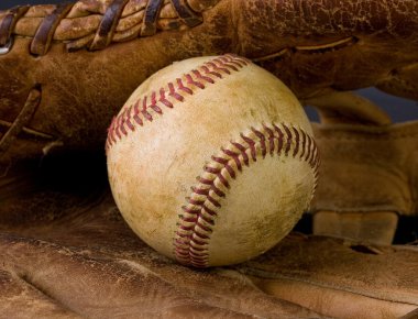 Worn baseball and old glove clipart