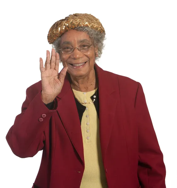 Stary african american kobieta macha — Zdjęcie stockowe