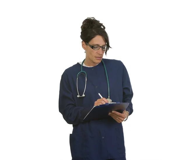 Medicinsk sjuksköterska skriva anteckningar — Stockfoto