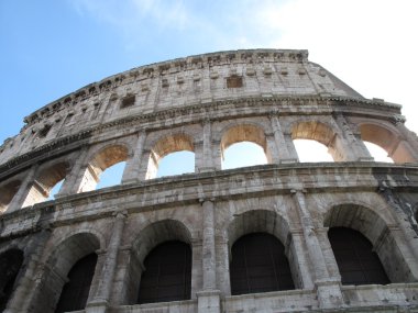 Colosseum in Rome with blue sky clipart
