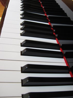 Piano keys with notes, musical background. clipart