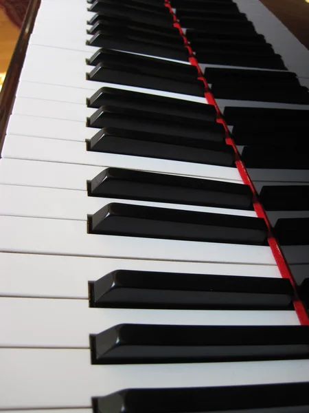 Klaviertasten mit Noten, musikalische Untermalung. — Stockfoto
