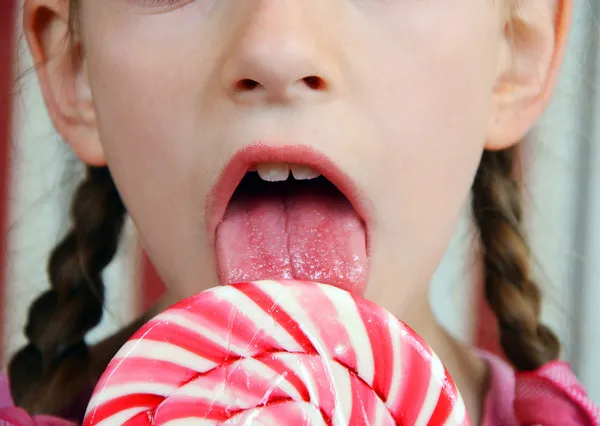 stock image Girl with a big candy lollipop