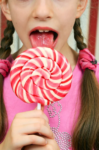 stock image Girl with a big candy lollipop