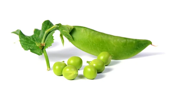 stock image Ripe peas with green leaf