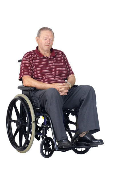 Грустный пожилой человек в инвалидной коляске — стоковое фото