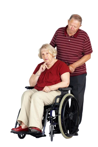 高级夫妇与坐在轮椅上的女人 — 图库照片