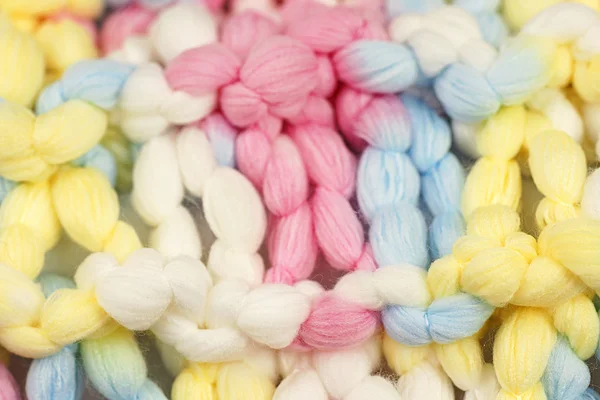 Macro shot of knitted pastel color wool or yarn — Stock Photo, Image