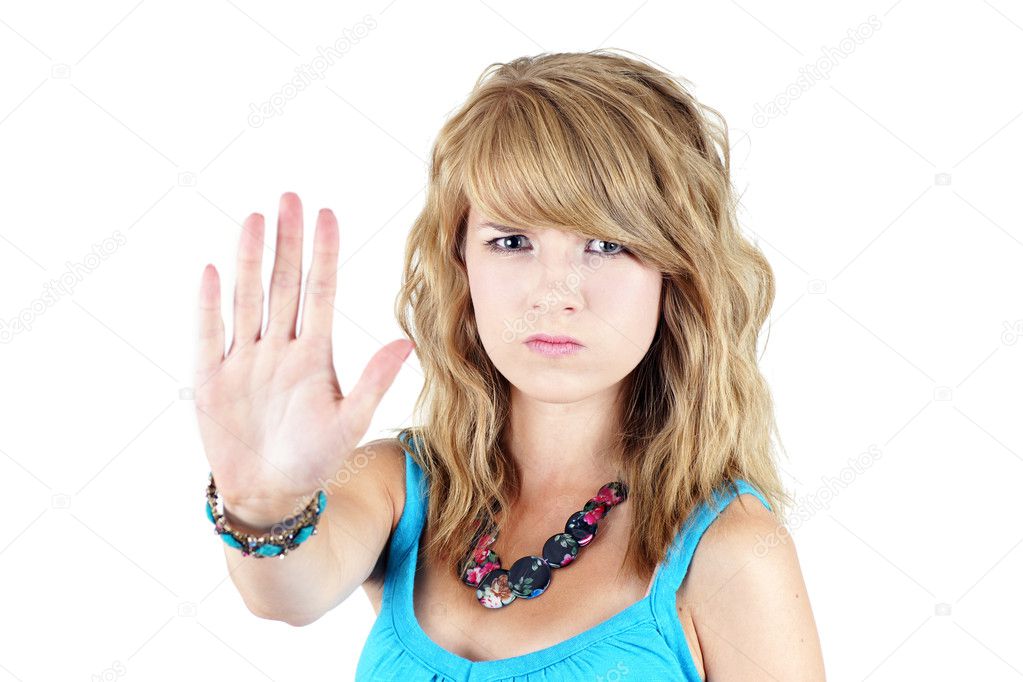 Young blond girl making STOP or NO gesture