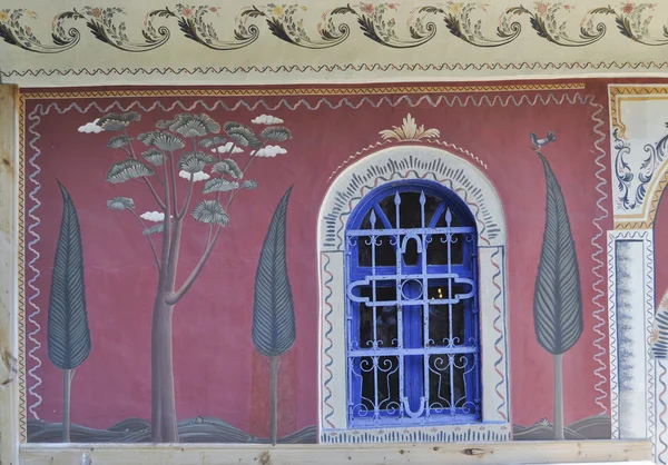 stock image Window and fresco on the monastery wall