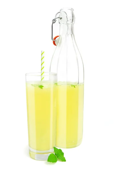 Glass and bottle of lemonade — Stock Photo, Image