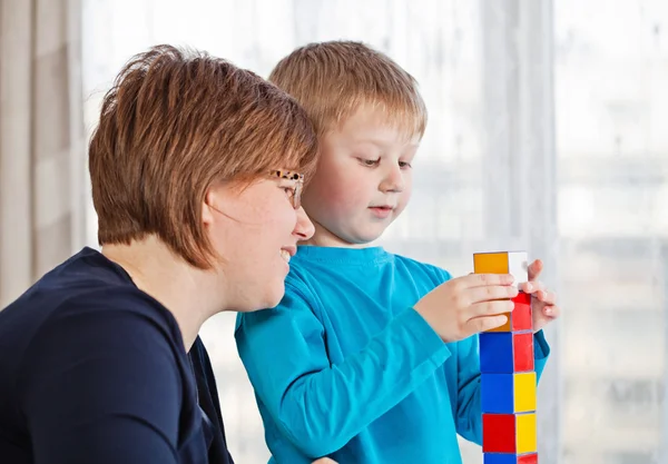 Mother and son playing together — Stock Photo, Image
