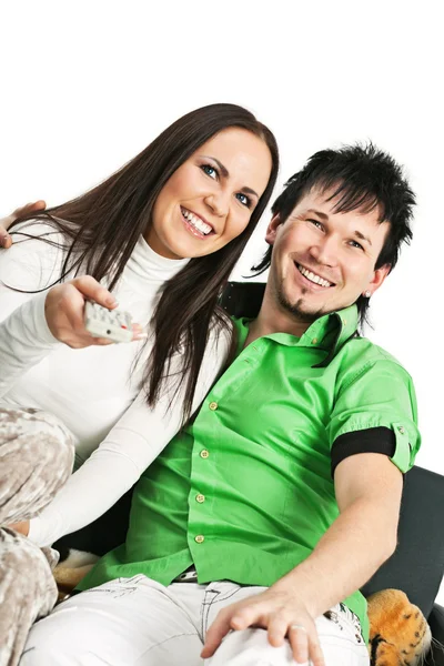 Glada par tittar på TV — Stockfoto