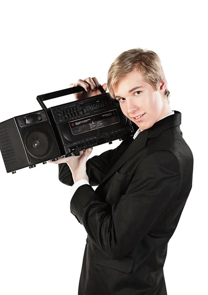 Junger Mann mit Stereoanlage — Stockfoto