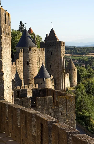 View at Carcassonne castle framed by an old stone — Stock Photo, Image